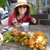We eat it! The humongous seafood platter we enjoyed with a bottle of white wine overlooking the harbour in downtown Auckland on Dee's first day in New Zealand
